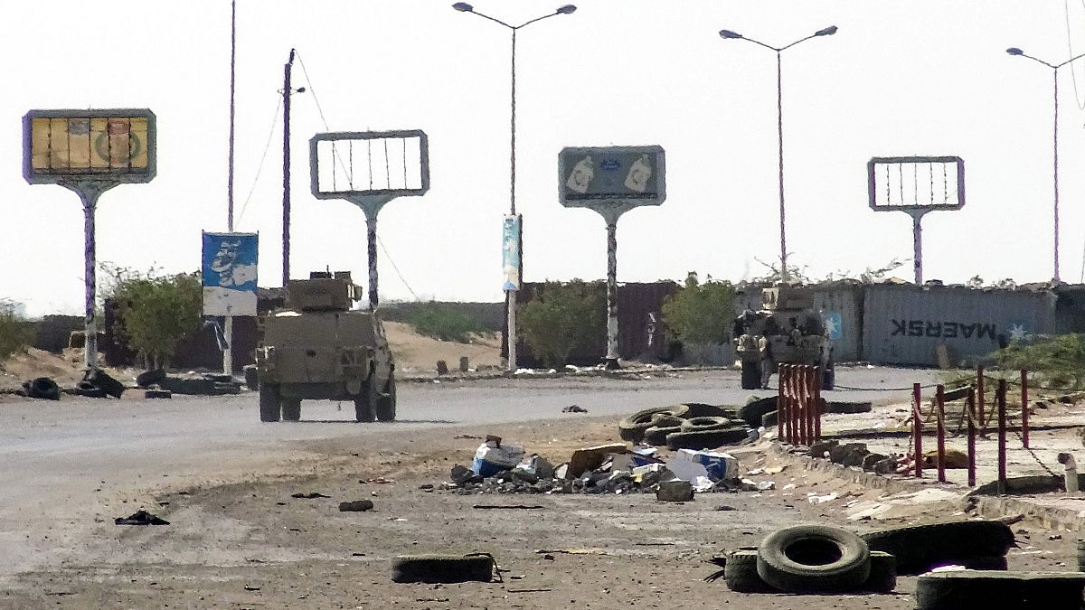 Image: Armoured vehicles of the Yemeni pro-government forces are seen drivi