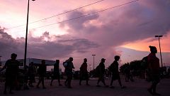 Migrants heading in a caravan to the U.S. start their march towards Matias 