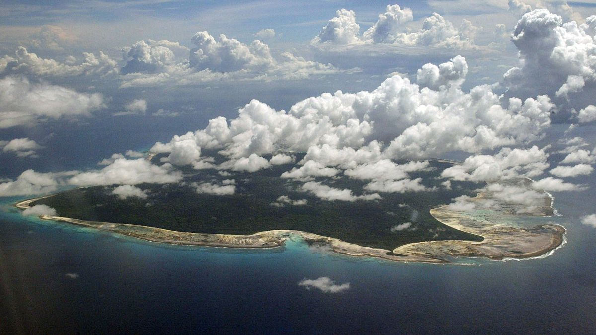 Image: Clouds hang over the North Sentinel Island, in India's southeastern 