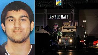 Suspect held over deadly US shopping mall shooting