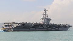 Image: U.S. Navy aircraft carrier USS Ronald Reagan during its visit to Hon