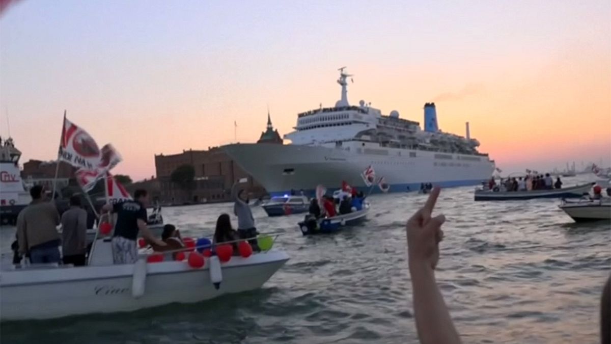 Venice canal comes to life amid noisy protest against large cruise ships