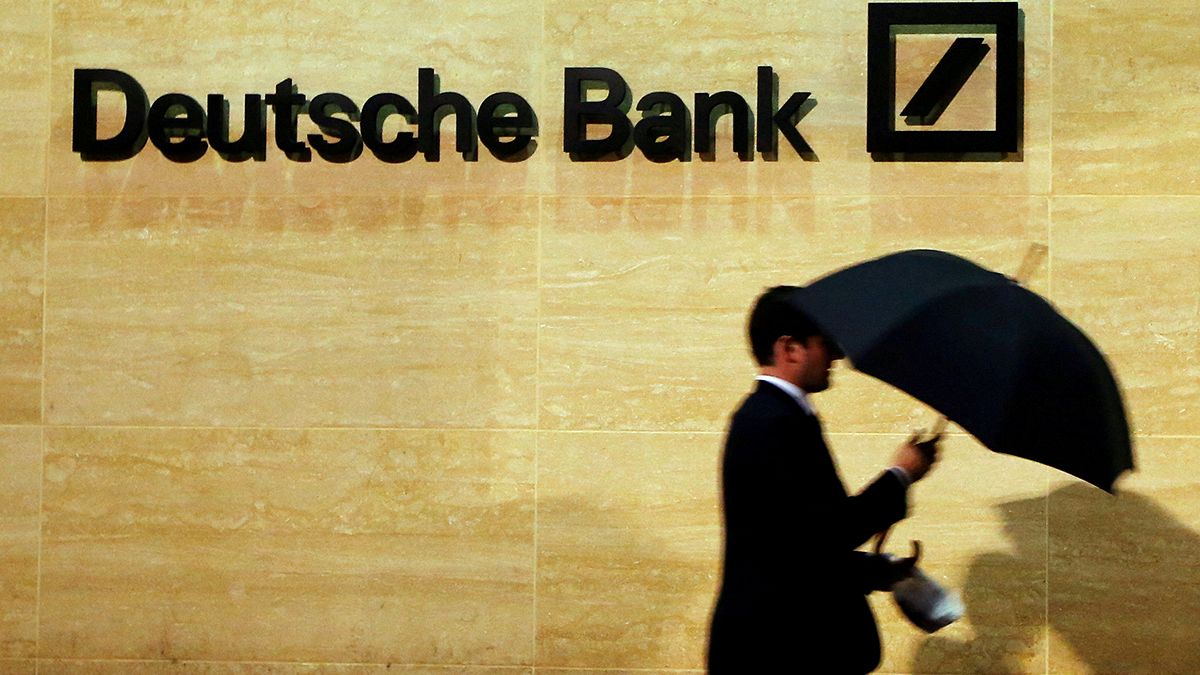 Deutsche Bank shares perk up on insurance sale, rescue plan denial