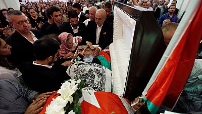 More than 1000 attend funeral of slain Jordanian writer