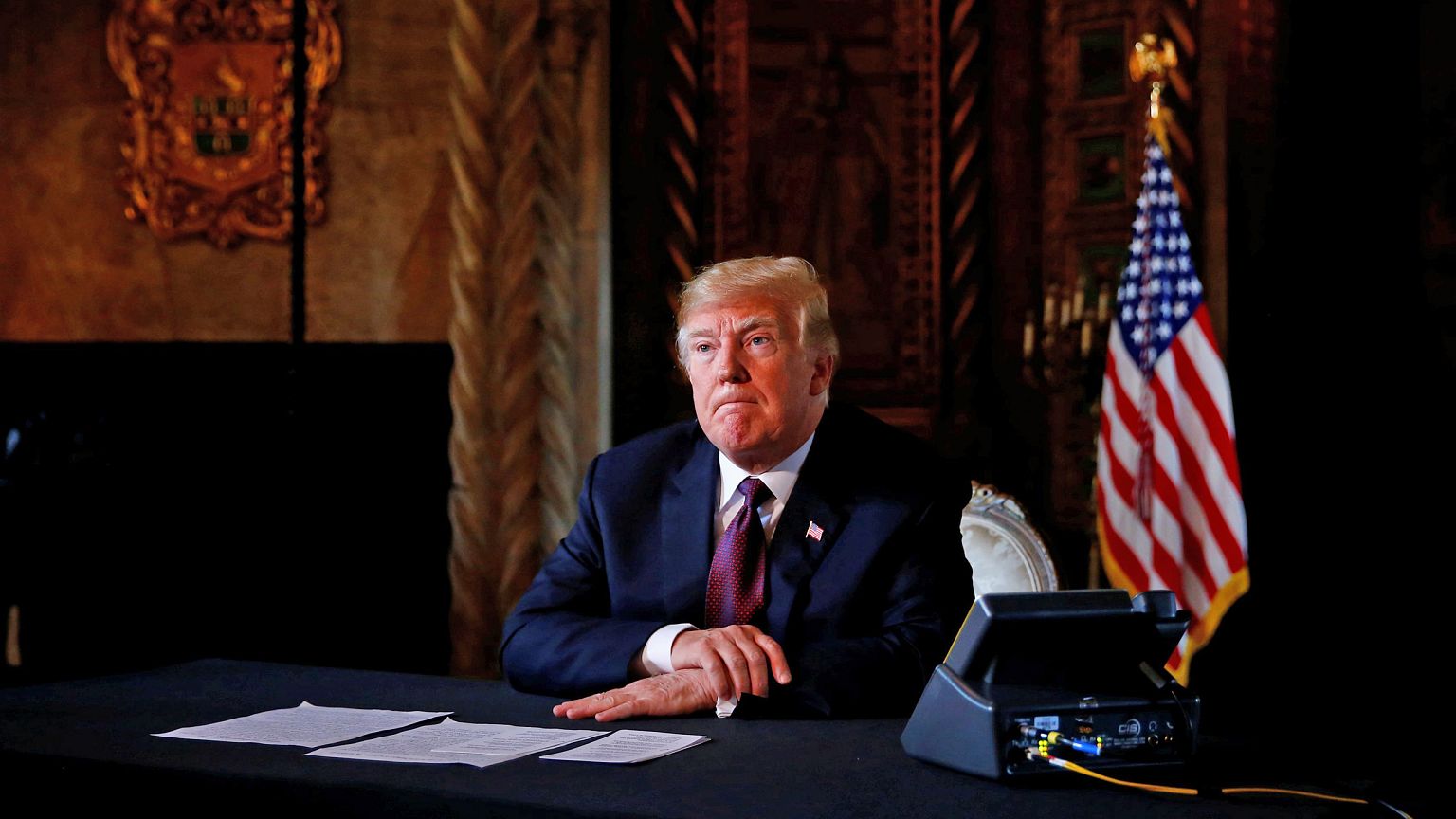 Image: U.S. President Donald Trump takes questions from the media after spe