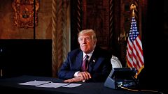 Image: U.S. President Donald Trump takes questions from the media after spe