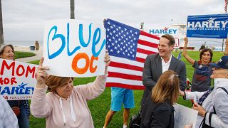 Democrat Harley Rouda greets supporters at a rally in Laguna Beach, Califor