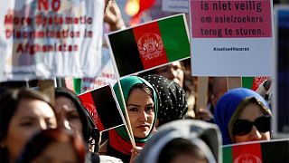 تظاهرات گروهی از شهروندان افغانستان در حاشیه کنفرانس بین‌المللی بروکسل