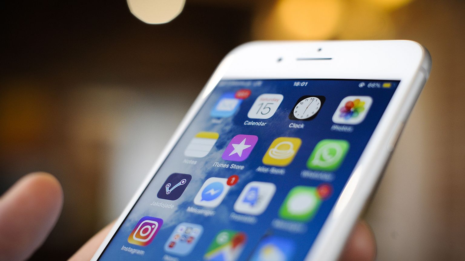 Social media applications are seen on an iPhone 8 plus in this photo illust
