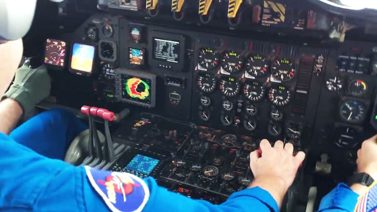 Video: Inside cabin of plane flying through the eye of Hurricane Matthew