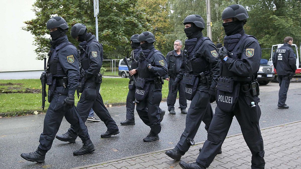 German police hunt for Syrian after explosives found in his flat