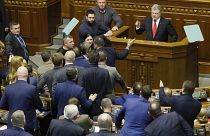 Ukrainian President Petro Poroshenko speaks during a parliament session to