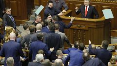 Ukrainian President Petro Poroshenko speaks during a parliament session to 