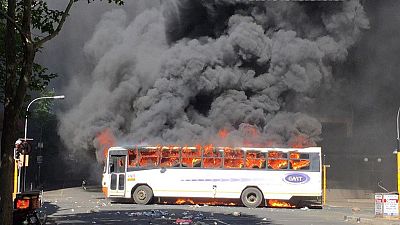 Priest shot, bus burned in violent South African student protests