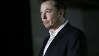 Image: Elon Musk of The Boring Company listens as Chicago Mayor Rahm Emanue