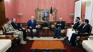 Afghanistan's President Ashraf Ghani, right, and U.S. special envoy for pea