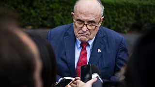 Rudy Giuliani speaks with reporters at the White House