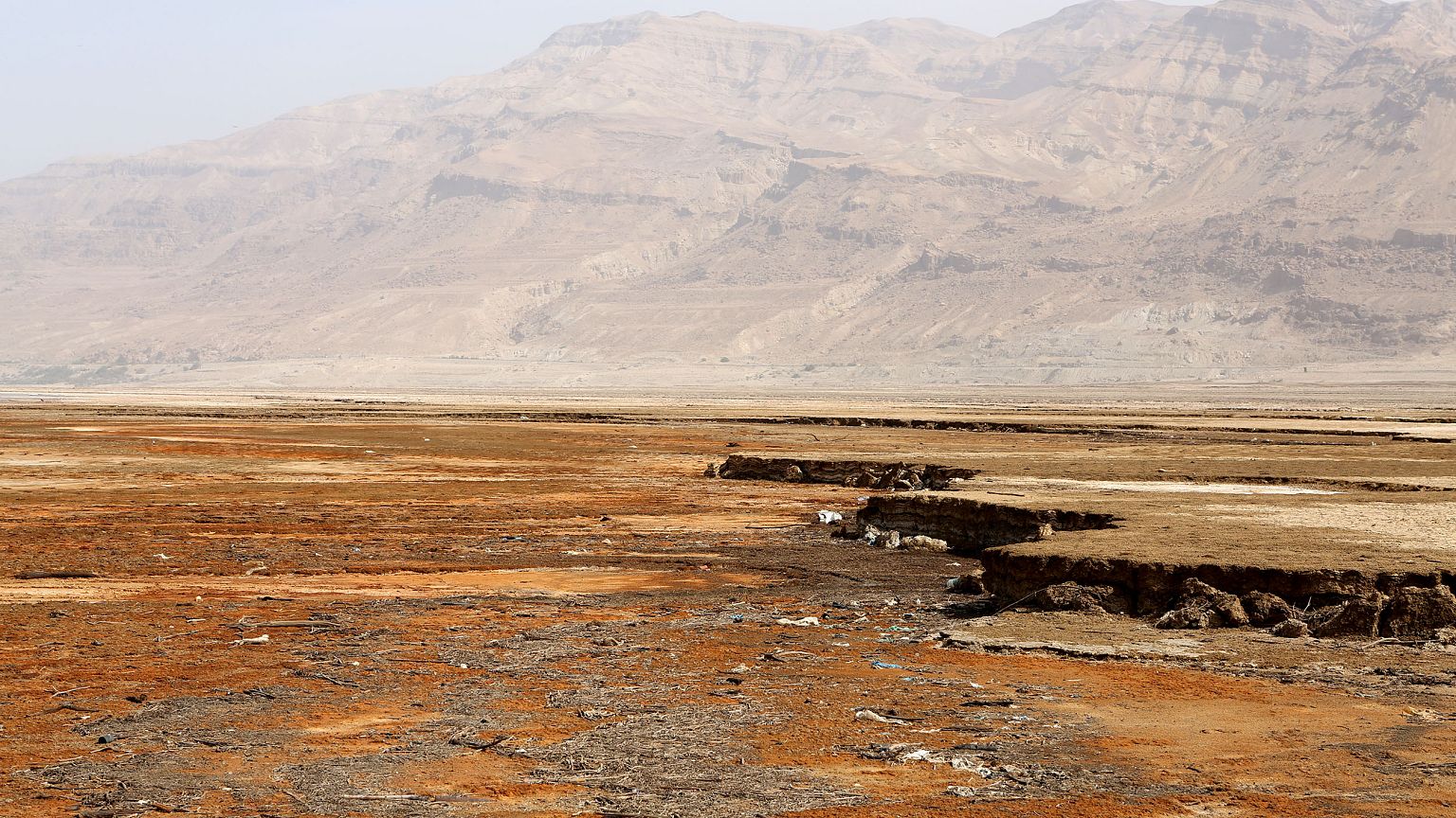 Image: Salt and sand of the sea bed where the waters of the Dead Sea once s