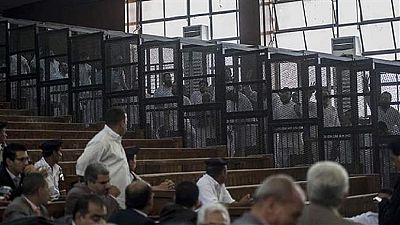 18 Egyptian trial defendants sentenced for cheering after one throws shoe at judge