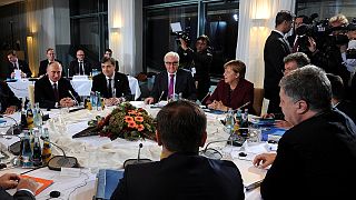 Four-way talks agree on road map to restart Ukraine's peace deal