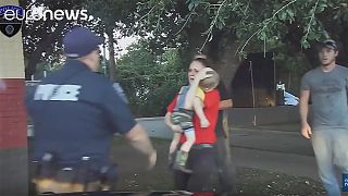 Watch: Policeman saves life of boy, three, after youngster's seizure