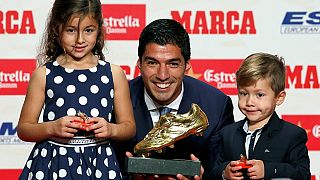 Luis Suarez' kids present the European Golden Boot trophy to him