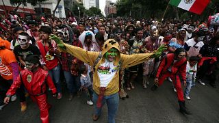 Zombies march for equality through Mexico City