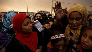 Iraqis arrive at army checkpoint