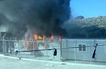 Fire at Greek migrant camp as frustrations boil over
