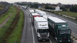 Hundreds of trucks block a highway near Arles, France