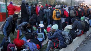 Demolition due to begin as migrants continue leaving Calais 'Jungle'
