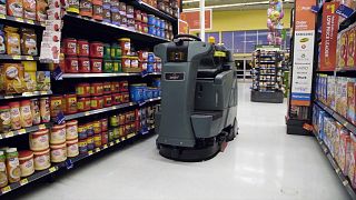 Walmart's BrainOS-powered floor scrubbers are equipped with sensors to clea