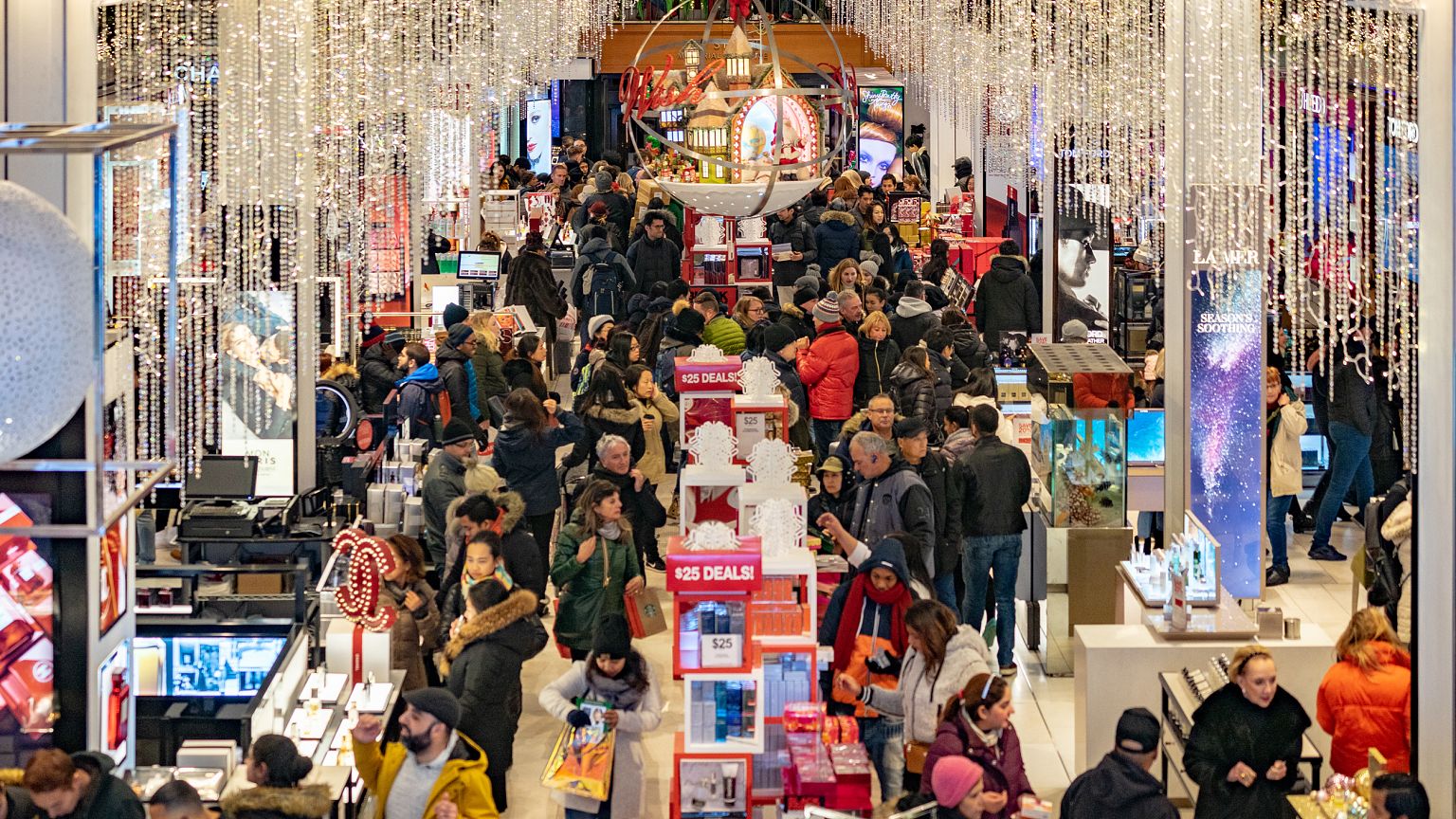 People shop at Macy's for the early Black Friday sales in New York on Nov. 