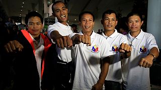 Filipino sailors freed by pirates arrive home in Manila