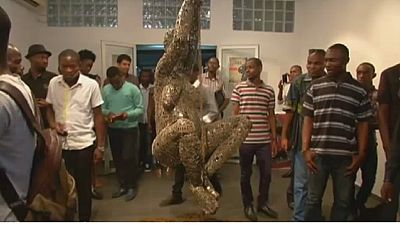 Congo sculptor brings objects of war to life