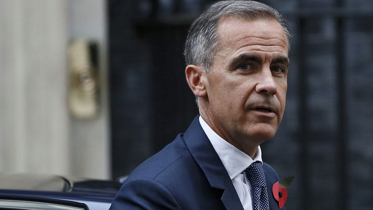PM britânica defende continuidade de Mark Carney fica no Banco de Inglaterra até meados de 2019