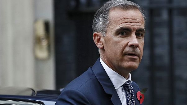 PM britânica defende continuidade de Mark Carney fica no Banco de Inglaterra até meados de 2019 PM britânica defende continuidade de Mark Carney fica no Banco de Inglaterra até meados de 2019