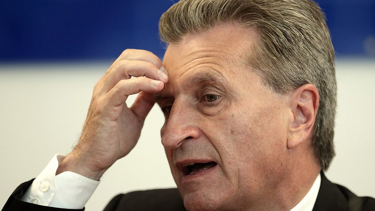 EU's Oettinger issues apology over Chinese 'slitty-eyed' slur