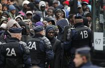 Police clear thousands from Paris migrant camp