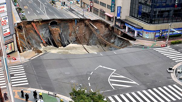Watch Large Sinkhole Opens Up In Japan Swallowing Four Lane