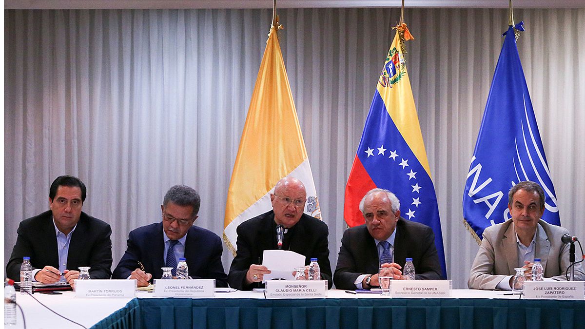 Venezuela retiene el aliento a la espera de los resultados de la reunión entre el Gobierno y la oposición