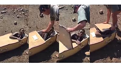 S. Africa: Two 'white racists' force man into coffin, threaten to burn him (Video)