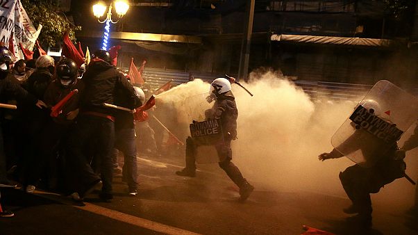 Greek protesters clash with police during Obama visit Greek protesters clash with police during Obama visit