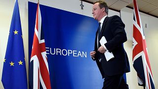 Image: British Prime Minister David Cameron leaves after delivering a press