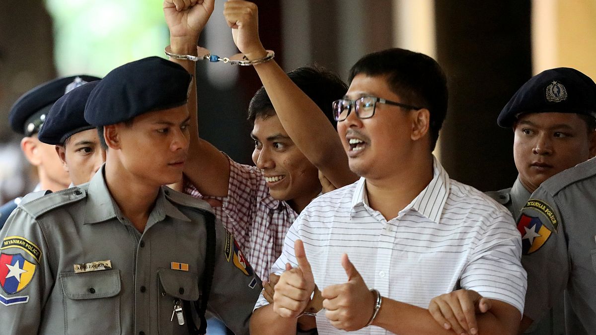Image: Detained Reuters journalist Wa Lone and Kyaw Soe Oo arrive at Insein