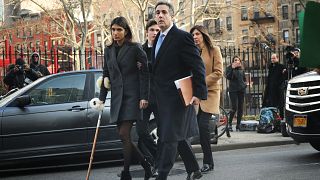 Image: Michael Cohen walks to federal court with his children and wife in M
