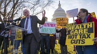 Image: Sen. Bernie Sanders joins protesters outside the Capitol as Republic