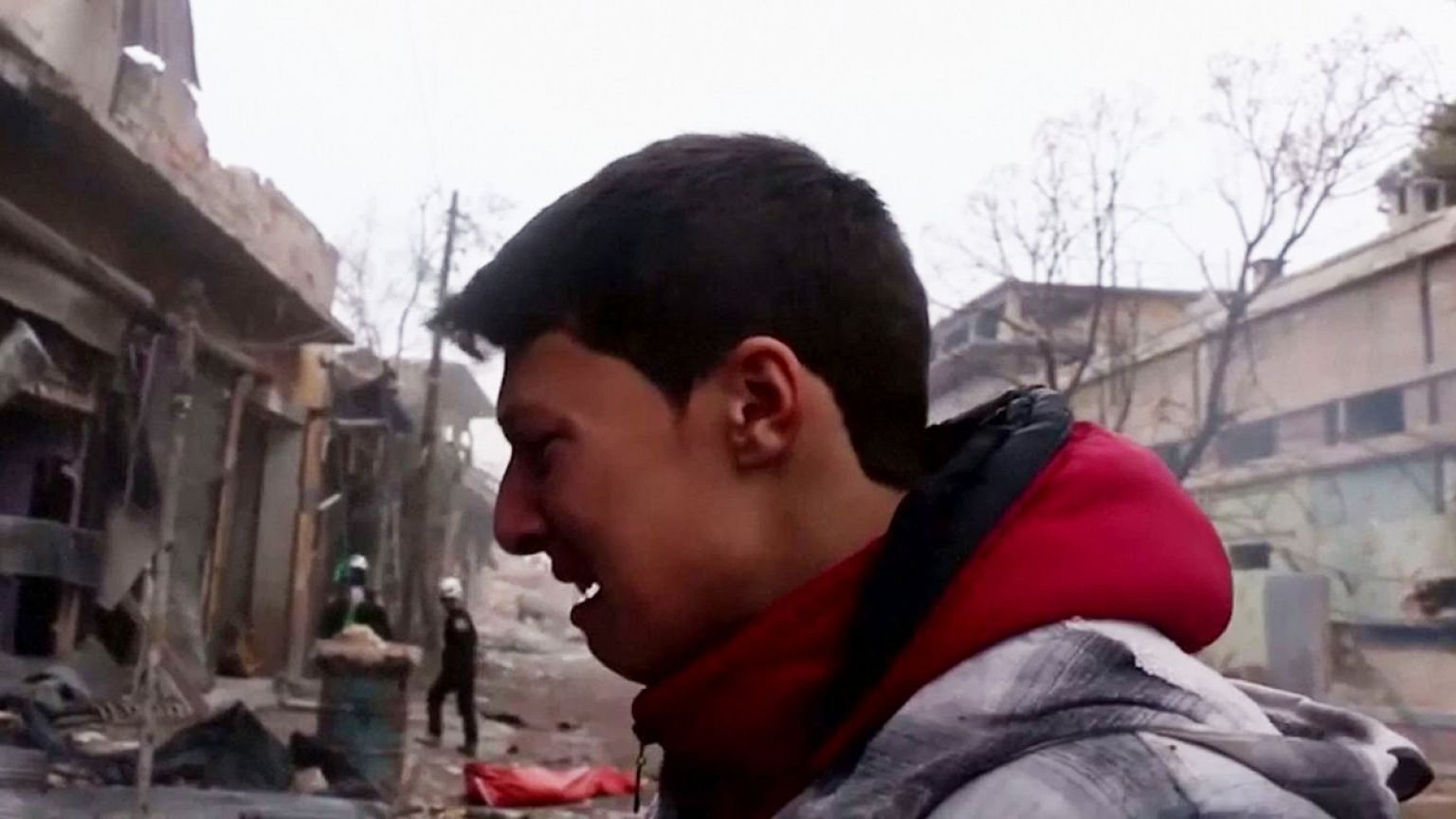 GRAPHIC: Boy cries over mother's dead body in eastern Aleppo