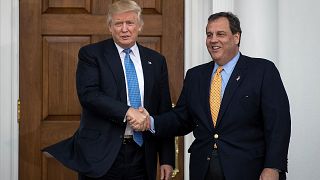 Donald Trump and Chris Christie shake hands before their meeting at Trump I