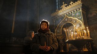 Image: Ukrainian Orthodox believers attend the Christmas Eve Mass in the St